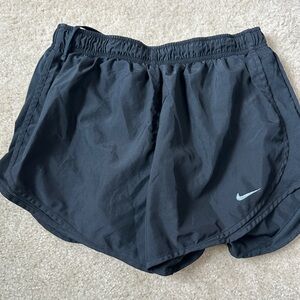 Black Nike women’s large, running shorts.